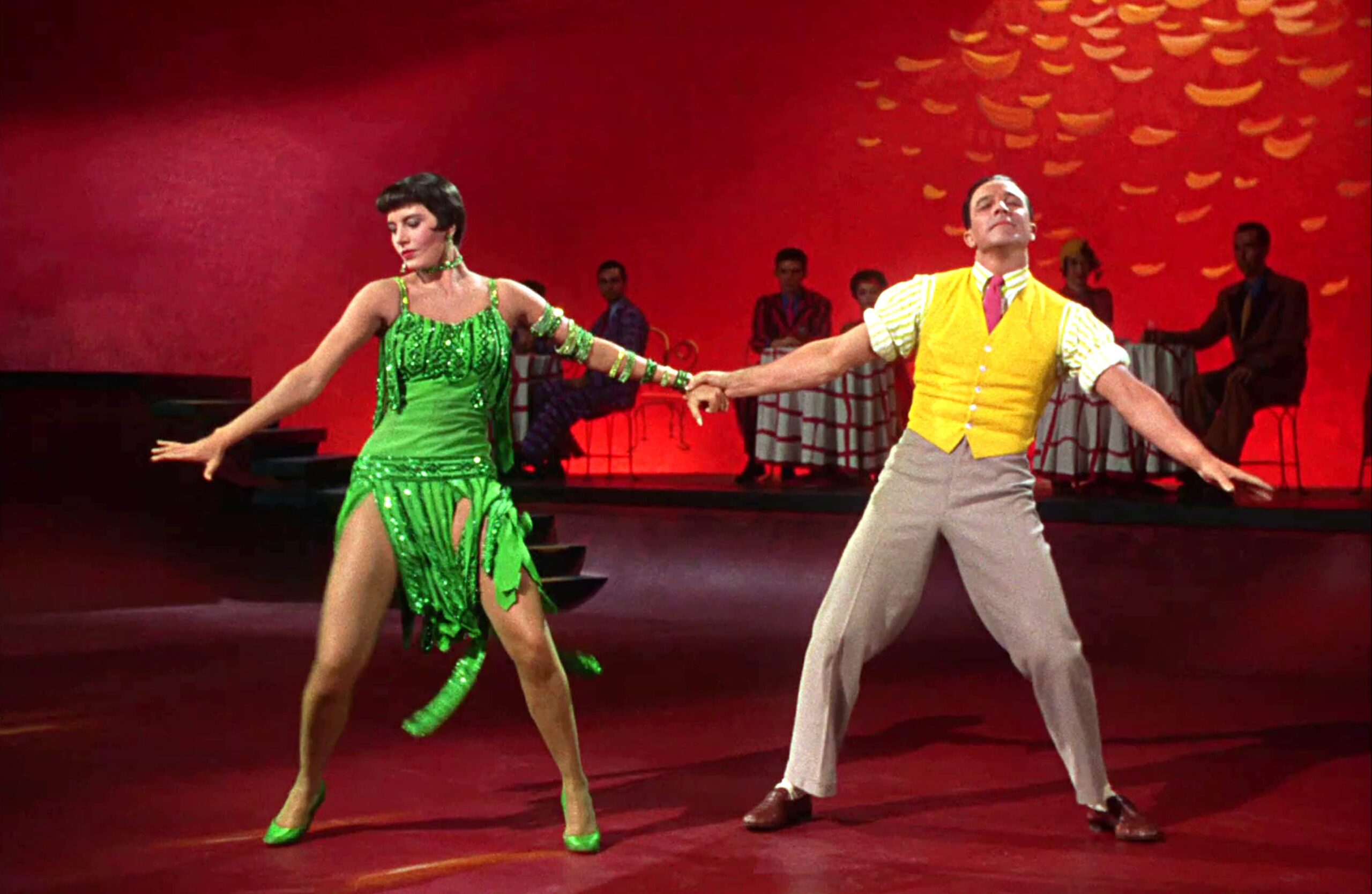 Cantando sotto la pioggia: Cyd Charisse e Gene Kelly nella scena Broadway Melody