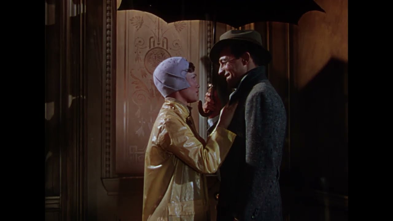 Cantando sotto la pioggia: Debbie Reynolds e Gene Kelly in una scena del film