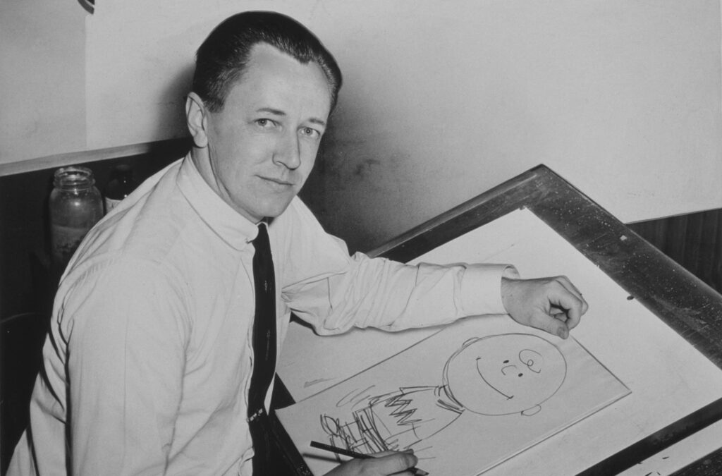 Charles Schulz al tavolo di disegno