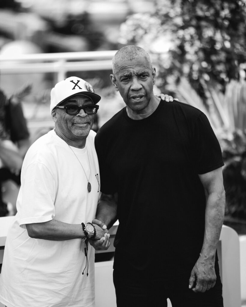 Spike Lee e Denzel Washington al photocall ufficiale di Highest 2 Lowest a Cannes 2025 (@Giulia Parmigiani per ScreenWorld.it)